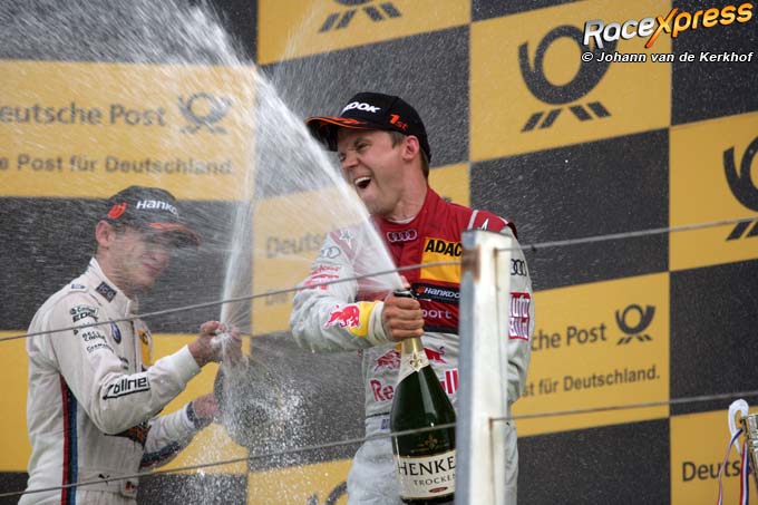 Mattias Ekstrom op het podium op Circuit Park Zandvoort - Johann van de Kerkhof